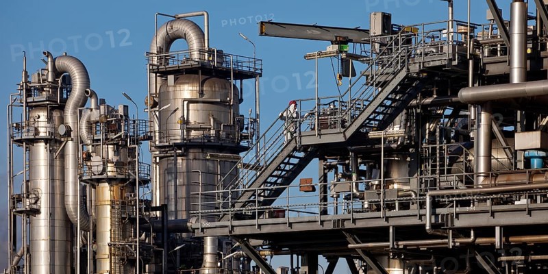 Worker on a line at the Ineos chemical plant, Moers, North Rhine-Westphalia, Germany
