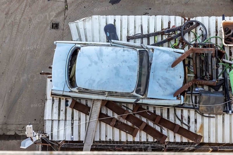 Metals are stored in a scrapyard in the harbour: scrap metal is a valuable raw material for recycling. Including a scrap-ready Trabant vehicle. Mannheim, Baden-Württemberg, Germany
