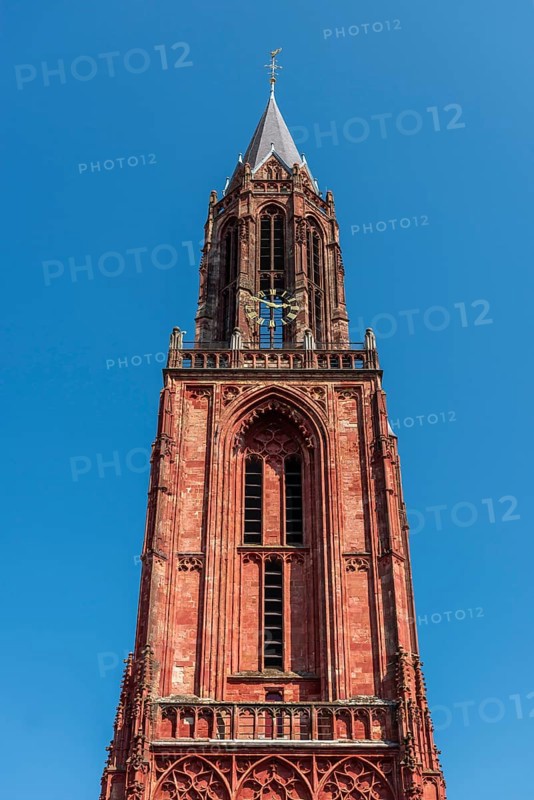 Maastricht, Netherlands, The Protestant Sint Janskerk rises against a clear blue sky
