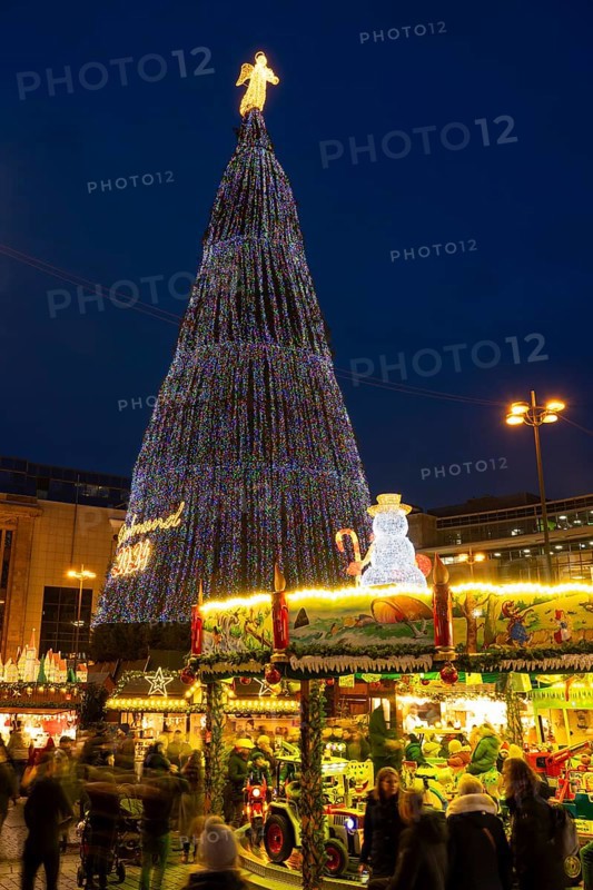 Largest Christmas tree in the world, coloured lights and angels on top, Christmas market, Dortmund, Ruhr area, North Rhine-Westphalia, Germany