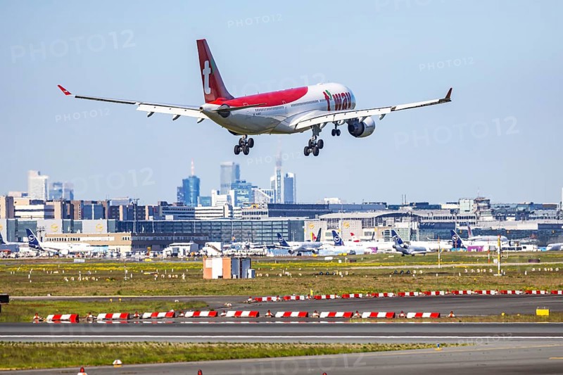Fraport Airport in Frankfurt am Main. Aircraft landing against the backdrop of the banking district. Aircraft registration number: HL8227, T'Way, Air Airbus A330-200, Frankfurt am Main, Hesse, Germany
