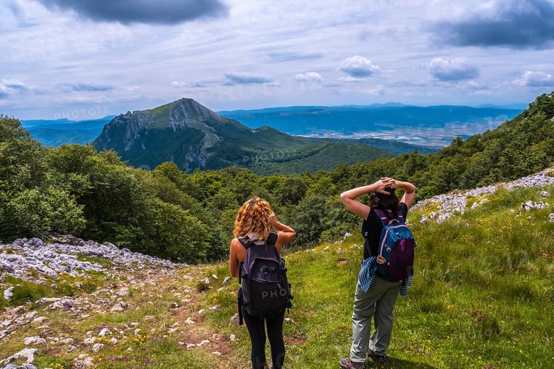 Mount Aizkorri 1523 meters, the highest in Guipuzcoa. Basque Country. Two friends on the trail to the top of Mt. Ascent through San Adrian and return through the Oltza fields