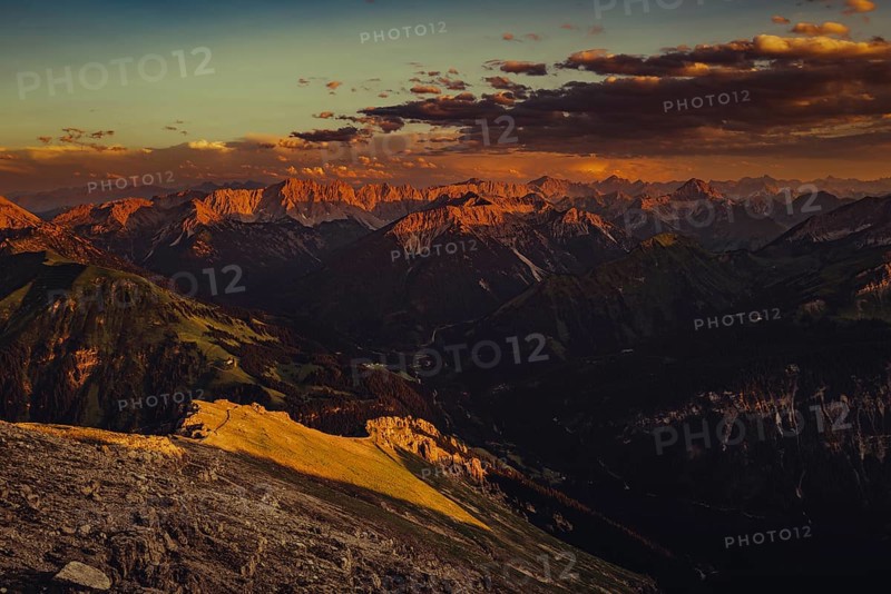 Thaneller summit at sunset in the Lechtal valley in Tyrol with a wonderful view of the surrounding mountains. Tyrol, Austria