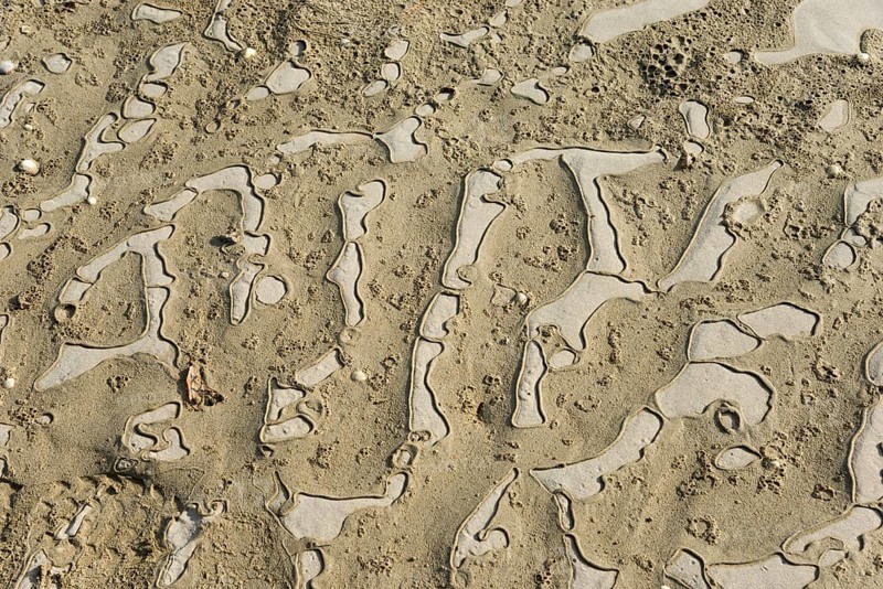 Detailed view of abstract, natural sand patterns on the coast, Plage Saint Efflamm, Plestin-les-Grèves, Breton Plistin, Arrondissement Lannion, Côtes-d'Armor, Brittany, France