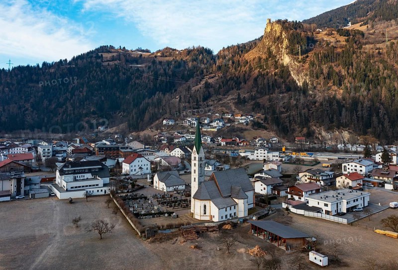 Drone shot, view of village with parish church, Prutz, Kaunertal, Inntal, Tyrol, Austria