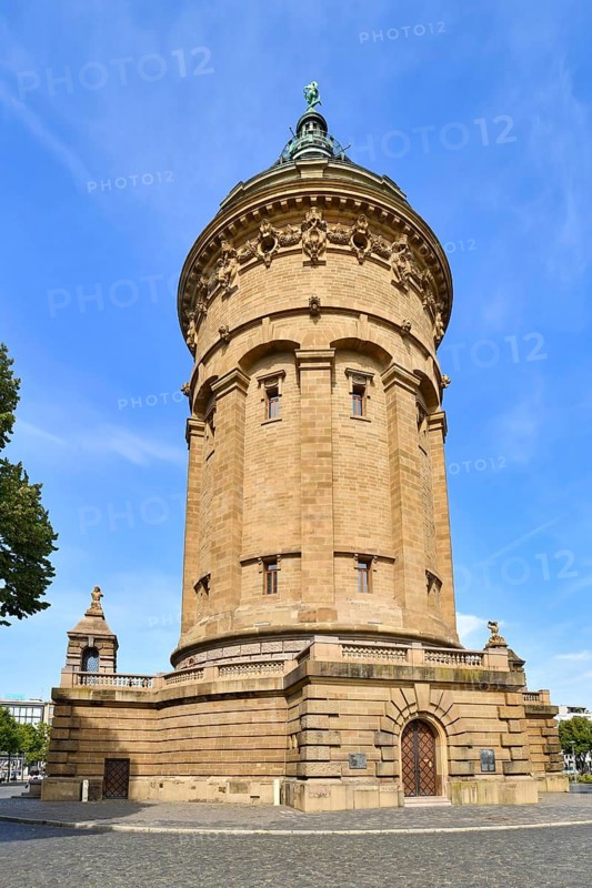 Mannheim, Germany, August 2022: Water Tower called 'Wasserturm', a landmark of German city Mannheim in small public park on sunny day
