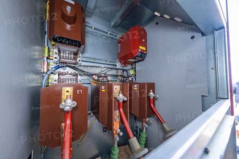 View into an open switch box with visible electrical components and cabling, switch cabinet construction, PV system construction, major customers, Enzkreis, Germany