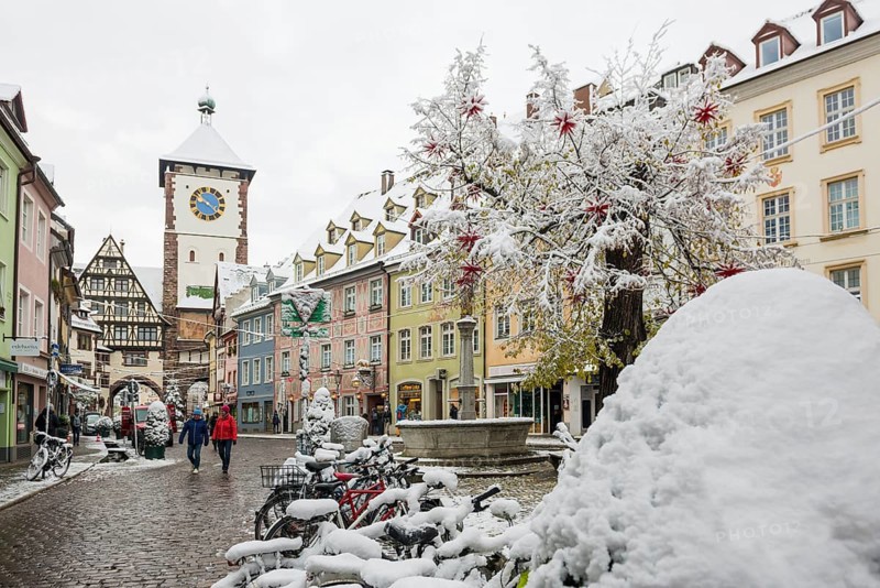 Houses covered with snow in the historic city centre, Freiburg im Breisgau, Black Forest, Baden-Württemberg, Germany