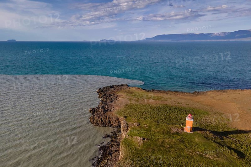 Drone picture, aerial view, lighthouse Hegranesviti, Hegranes, peninsula Landsendi, in the background island Drangey, near Sauðárkrokur, Skagafjörður, Iceland