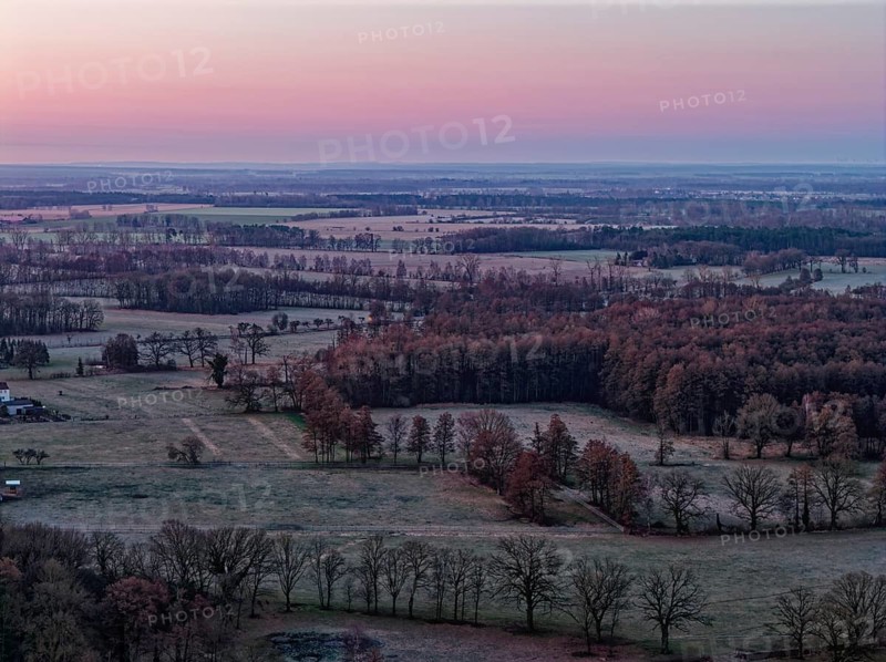 Landscape in the Drömling UNESCO Biosphere Reserve in the Altmark at dawn on a cold spring day. aerial view. Dannenfeld, Gardelegen, Saxony-Anhalt, Germany