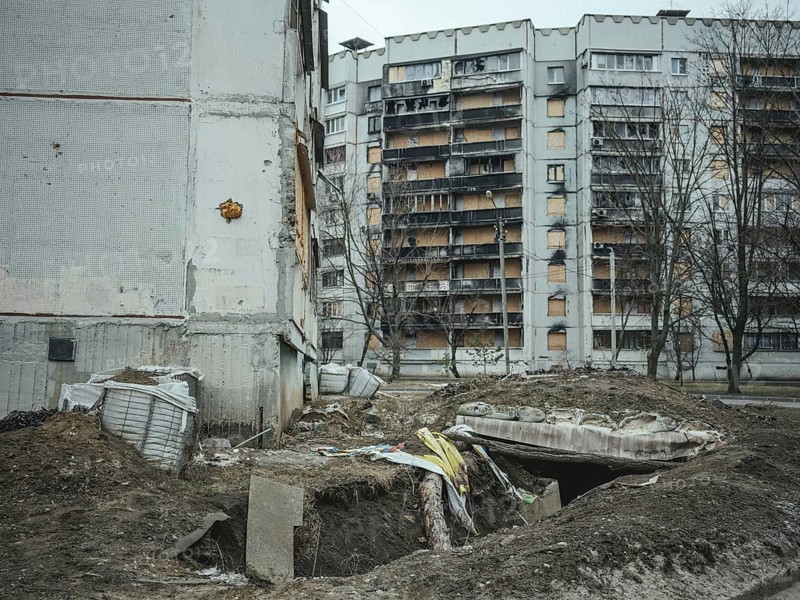 Trench and destroyed residential building in Saltivka, Kharkiv, Ukraine