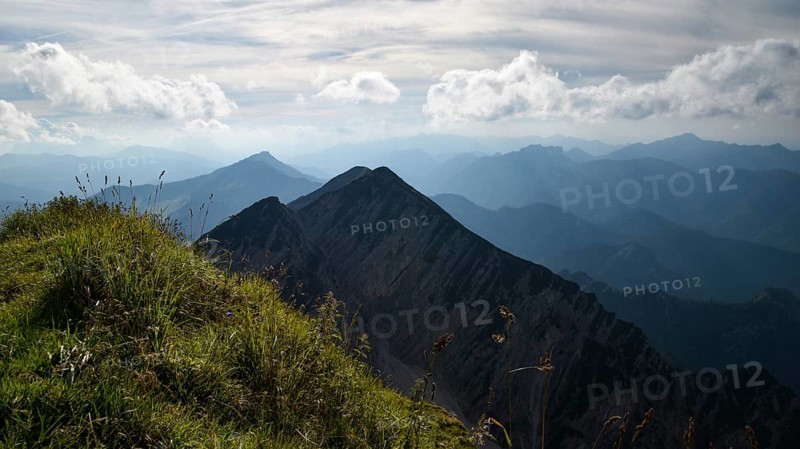 View from the summit of the Sonntagshorn, highest mountain in the Chiemgau Alps, towards the Reifelberge, Salzburger Land, Austria
