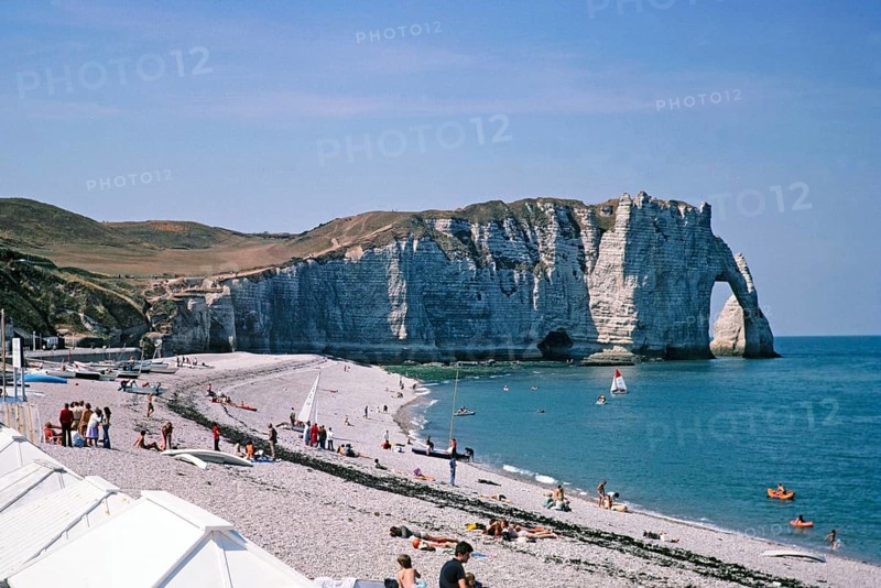 Chalk cliffs and sandy beach view to Falaise d'Aval, Etretat beach, Normandy, France 1976