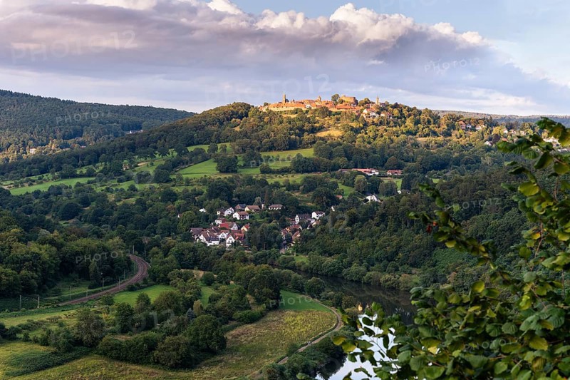 View of the historic Dilsberg castle fortress and the Neckar river in the Neckartal-Odenwald nature park. In the evening. Dilsberg, Neckargemünd, Rhine-Neckar district, Baden-Württemberg, Germany