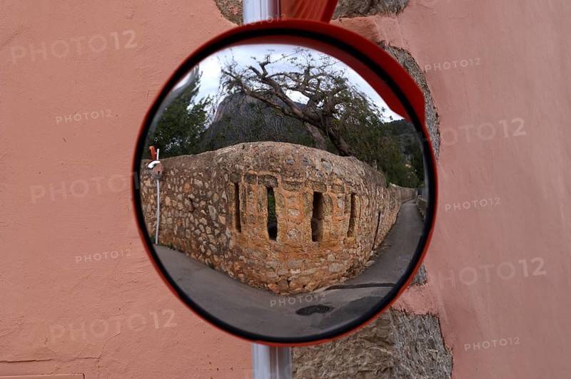 Reflection of a wall in a wide-angle mirror, traffic mirror 180 degrees, Alaró, Calvià, Majorca, Balearic Islands, Balearic Islands, Spain