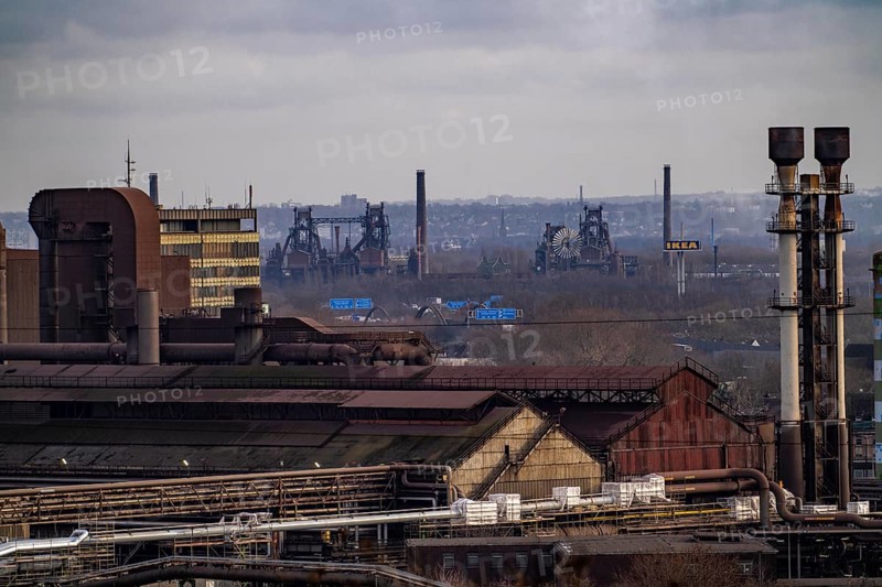 Panorama of the Thyssenkrupp Steel steelworks in Duisburg-Bruckhausen, oxygen steelworks and slab lines, in the background the former Thyssen steelworks Meidrich, today the Duisburg-Nord Landscape Park, blast furnaces, North Rhine-Westphalia, Germany
