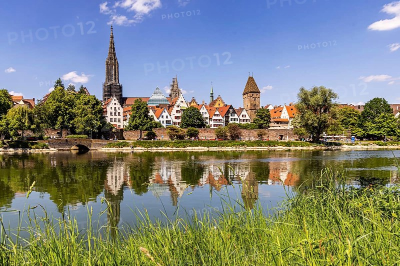 City view of Ulm with the Danube. Ulm Minster, Metzgerturm and old town. Ulm, Baden-Württemberg, Germany
