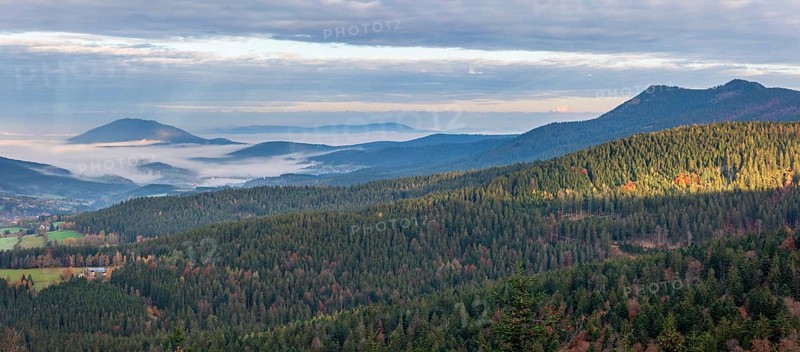 View from the Hindenburgkanzel over endless forests in autumn with valley fog, on the right the peaks Kleiner and Großer Osser, Bavarian Forest, Lower Bavaria, Bavaria, Germany