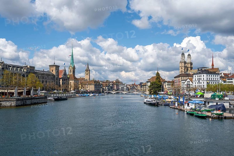 View from the Quaibrücke bridge over the Limmat river to the towers of the old town of Zurich, city view, Zurich, Switzerland