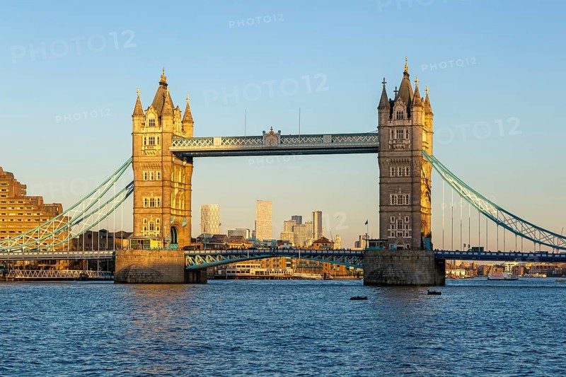 Tower Bridge in sunshine at dusk, River Thames from Southwark, London, England, UK