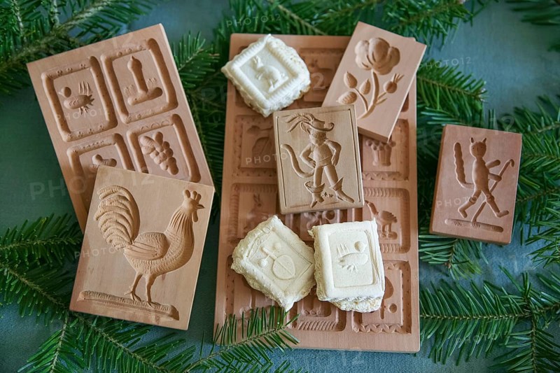 Swabian cuisine, Swabian Christmas biscuits, wooden moulds for making Springerle, model for shaping dough, traditional craftsmanship, typical Swabian, baking, Christmas bakery, sweet biscuits, Gutsle, Bredle, baked goods, from the oven, traditional cuisine, food photography, studio, Germany