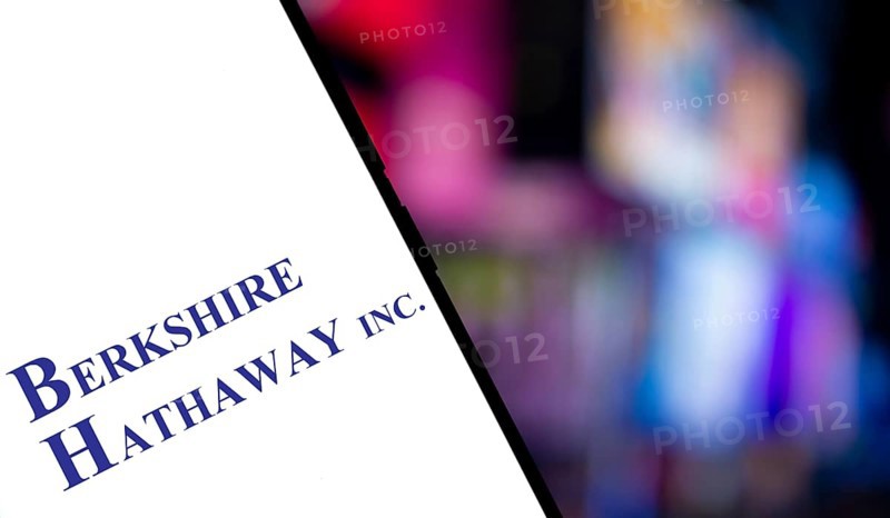 Berkshire Hathaway inc logo is displayed on smartphone. Berkshire Hathaway Inc is an American multinational conglomerate holding company.