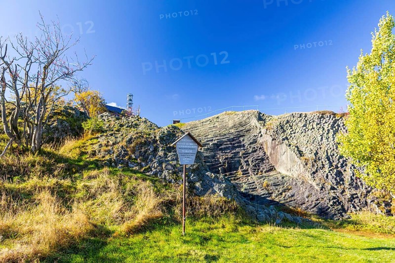 Exposed basalt columns from volcanic times, here the so-called giant staircase with information sign, Hirtstein, Marienberg, Erzgebirge, Saxony, Germany