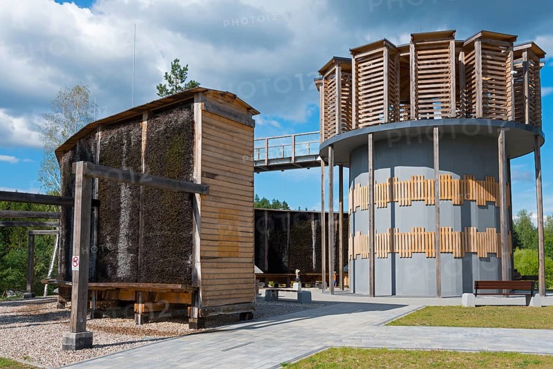Modern wooden construction with round tower and evaporating walls, clear blue sky with clouds, brine, graduation tower, observation tower, spa town Milomlyn, Milomlyn, Lviv, Warmia-Mazury, Poland