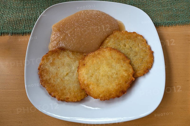 Franconian baggers, potato pancakes with apple sauce served in a pub, Franconia, Bavaria, Germany