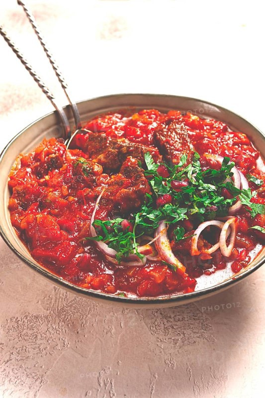 Chashushuli, a traditional Georgian dish, spicy, stewed meat with tomatoes and spices, homemade, no people