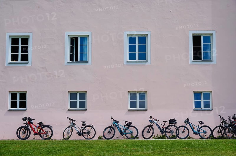 House facade, windows, bicycles, Ossiach Abbey, Ossiach, Lake Ossiach, Carinthia, Austria