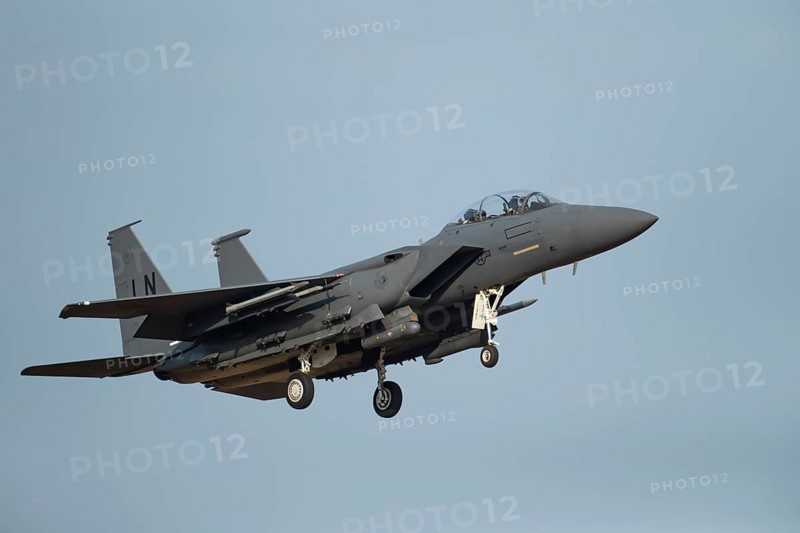 McDonnell Douglas F-15 Eagle aircraft in United States air force USAF colours flying on approach to land, England, United Kingdom