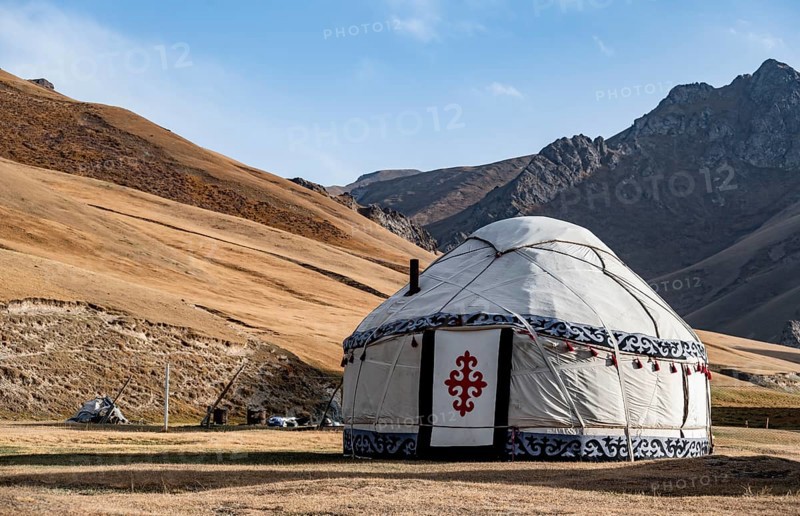 Yurts with yellow hills, Atbashy district in the Naryn region, Kyrgyzstan