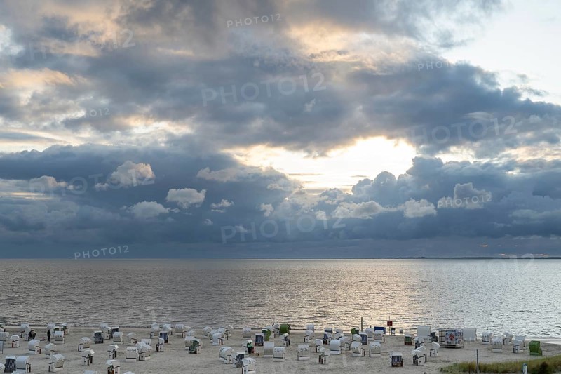 Beach chairs on the sandy beach, Dramatic sky over the North Sea, View from above, Norddeich, East Frisia, Lower Saxony, Germany
