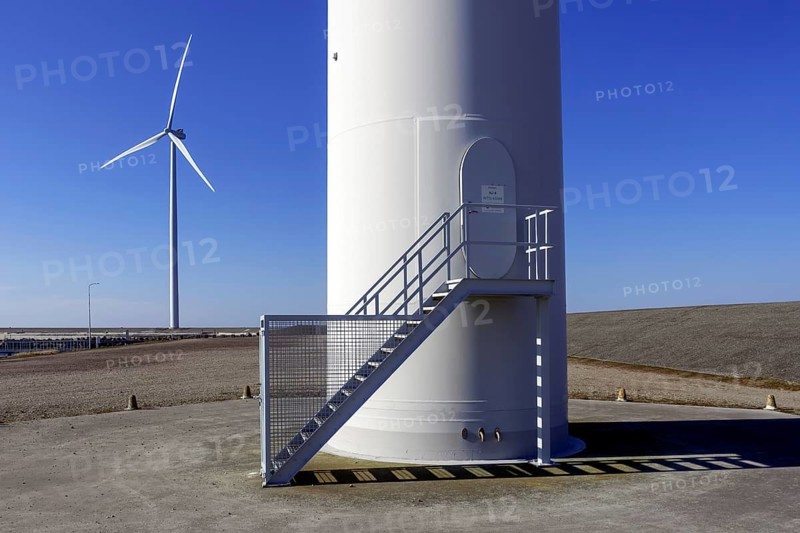 Entrance door to wind turbine tower at wind park, windfarm at Neeltje Jans, Eastern Scheldt storm surge barrier in Zeeland, Netherlands