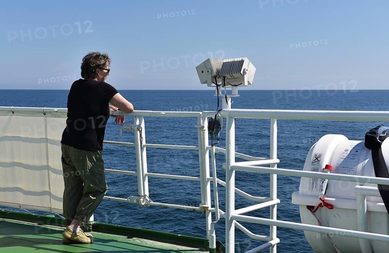 Woman travelling by sea to Heligoland, Schleswig-Holstein, Germany