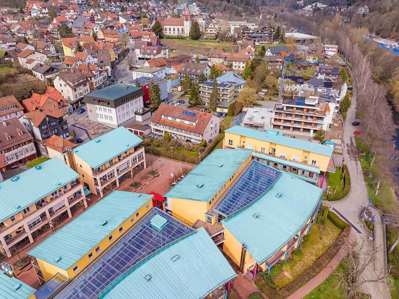 Urban landscape with green areas and colourful roofs in a peaceful spring atmosphere, Bad Liebenzell, Calw district, Germany