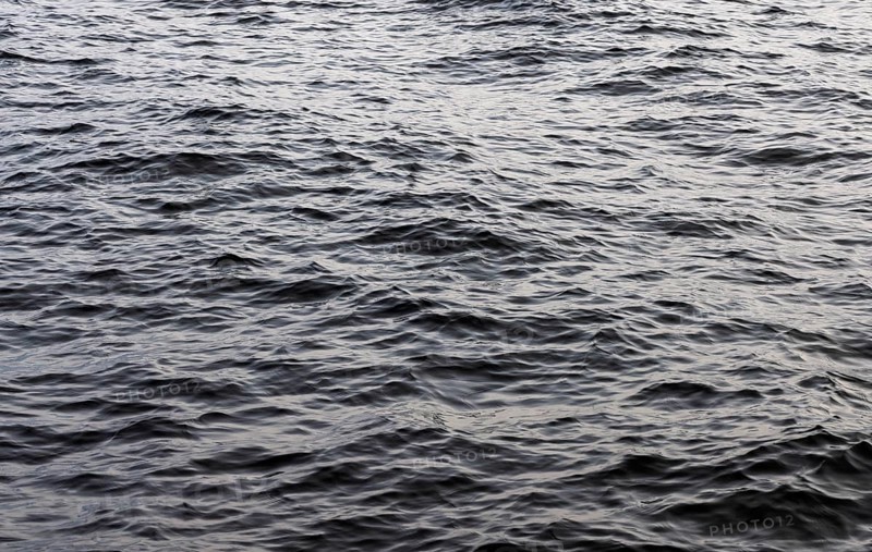 Moving water surface with small waves on the lake, Abstract background, Graphic elements, Mondsee, Salzkammergut, Austria