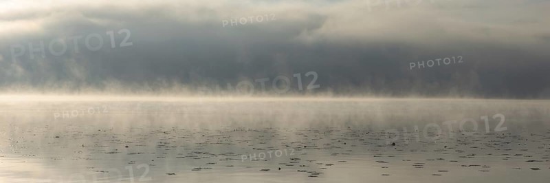 Sunrise with early morning fog at Lake Hopfensee near Füssen, Ostallgäu, Allgäu, Upper Swabia, Swabia, Bavaria, Germany