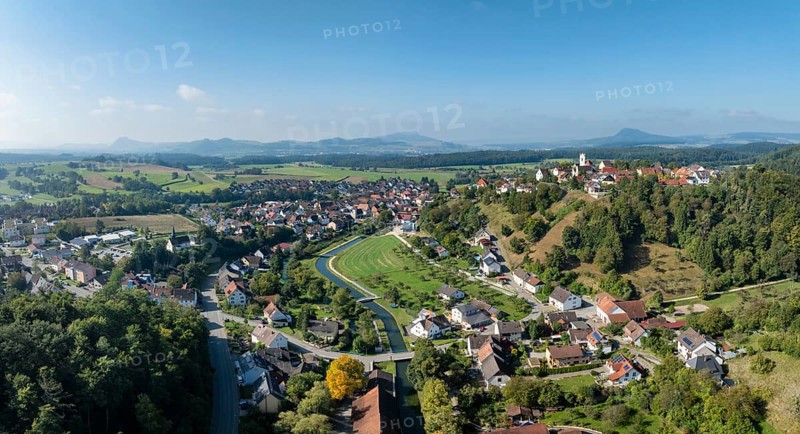 Aerial view, panorama of the town of Aach in Hegau, with the Radolfzeller Aach, which flows into Lake Constance, on the horizon the Hegau mountains, district of Constance, Baden-Württemberg, Germany