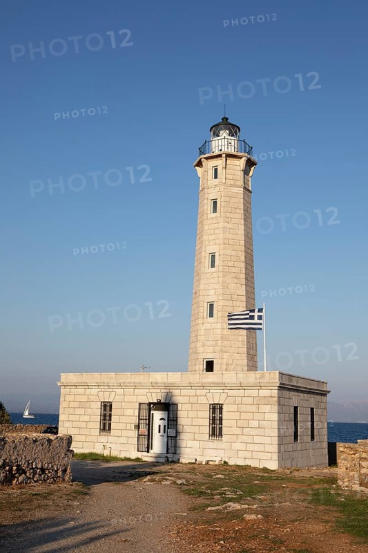 Octagonal lighthouse on the small island of Kranai in the evening light, Gythio or Gythion on the Laconian Gulf, Mani Peloponnese, Greece