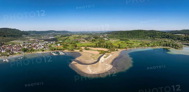 Aerial view, panorama of the mouth of the Stockacher Aach at low water, which flows into Lake Überlingen. The sedimentation of the suspended matter and sediment carried by the tributary gradually silts up the shore zone near Bodman-Ludwigshafen. Lake Constance, district of Constance, Baden-Württemberg, Germany