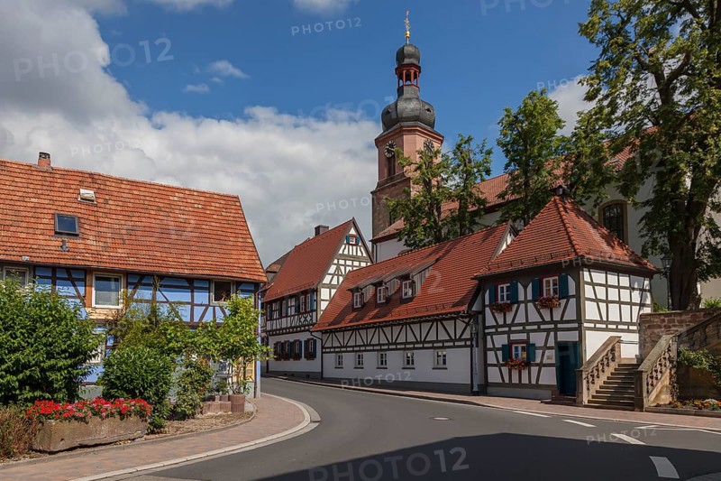 Dorfstraße in Rheinzabern, tower of the parish church of Saint Michael, Rheinzabern, Southern Palatinate, Palatinate, Rhineland-Palatinate, Germany