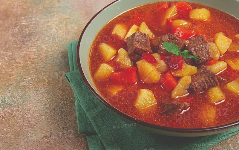 Meat goulash, with potatoes and carrots, sweet pepper, traditional Hungarian soup, homemade, no people