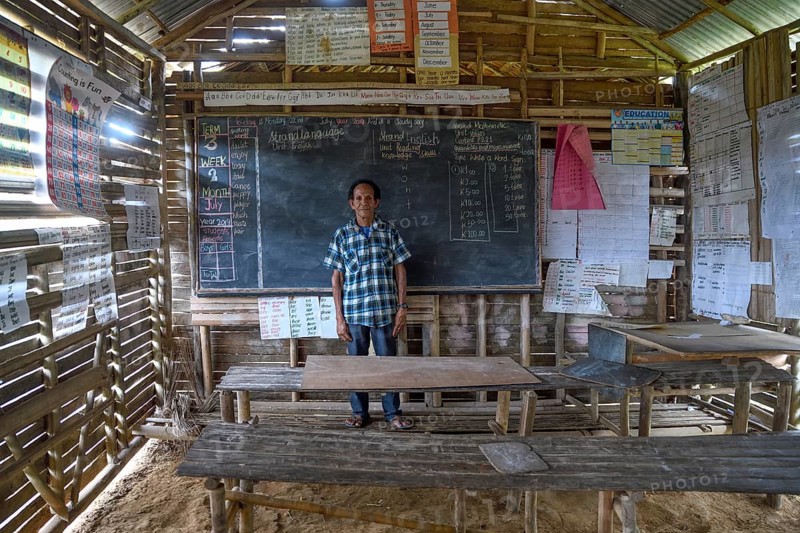 Local teacher in a school in the village of Upovia, Lake Murray, Western Province, Papua New Guinea
