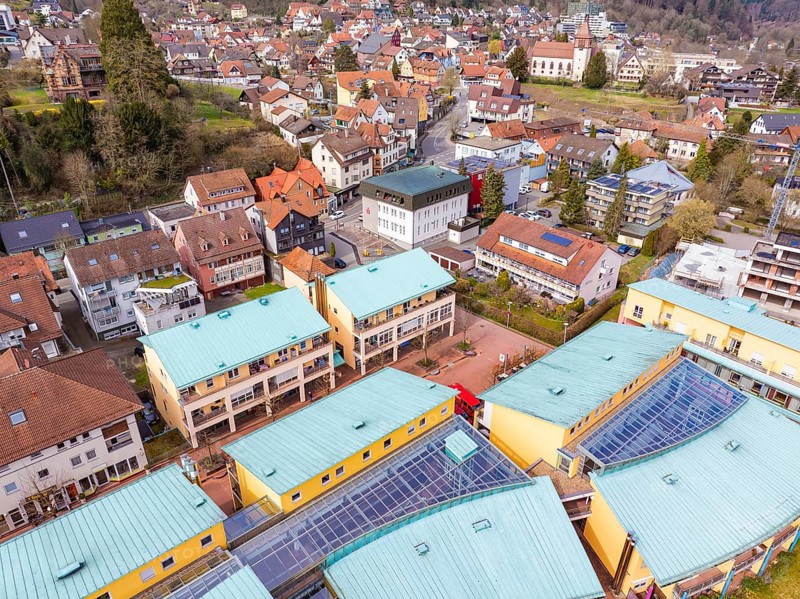 Overview of a residential area with colourful roofs and hills in a small town, Bad Liebenzell, district of Calw, Germany