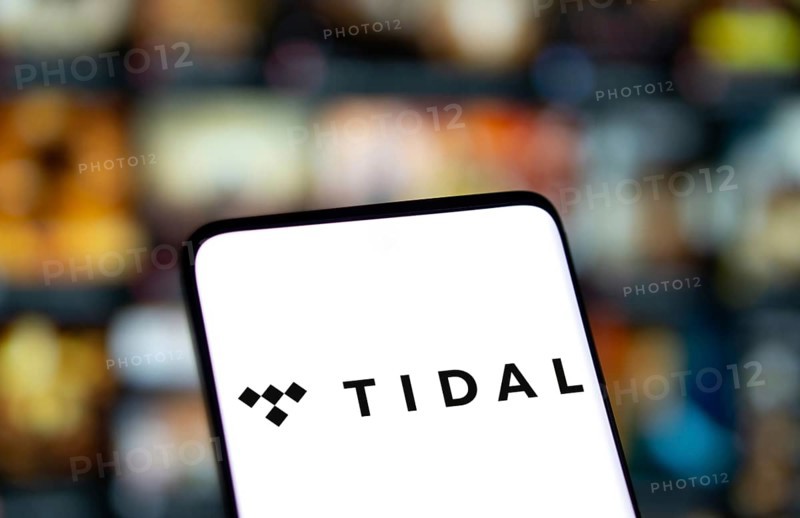 Tidal logo is displayed on smartphone. Tidal is a Norwegian-American music streaming service company