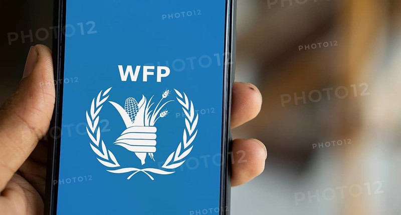 World Food Programme (WFP) logo is displayed on smartphone.
