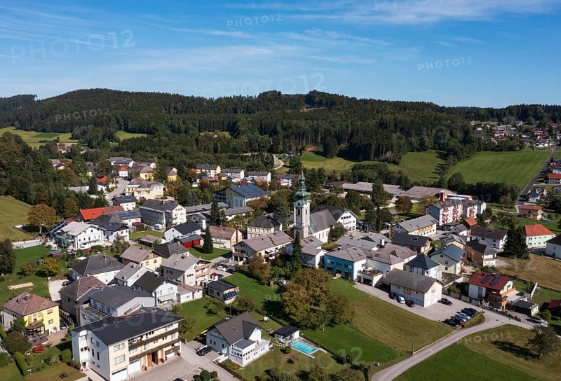 Drone image, view of the village with parish church, Ampflwang im Hausruckwald, Hausruckviertel, Upper Austria, Austria