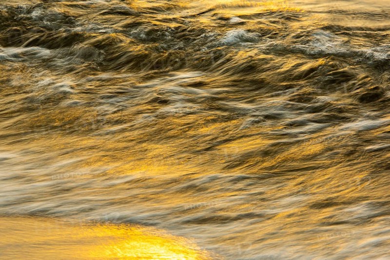 Waves at sunset on the west beach of Fischland-Darß-Zingst, Baltic Sea, Ahrenshoop, Mecklenburg-Western Pomerania, Germany